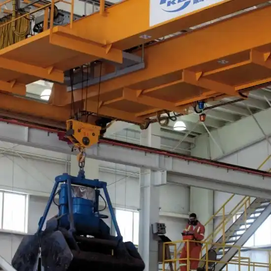 Heavy-duty scrap handling crane with load weighing system